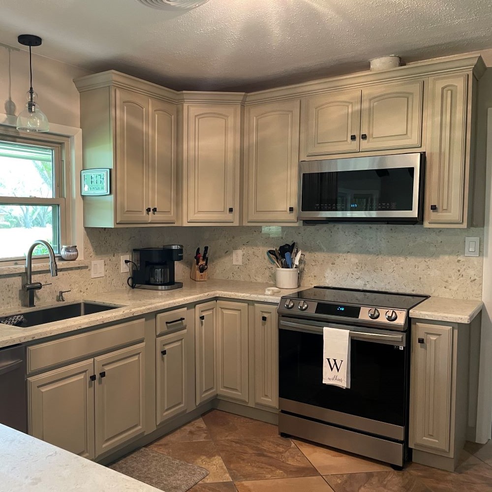 Beautiful grey-green countertops installed by El Campo Carpet One